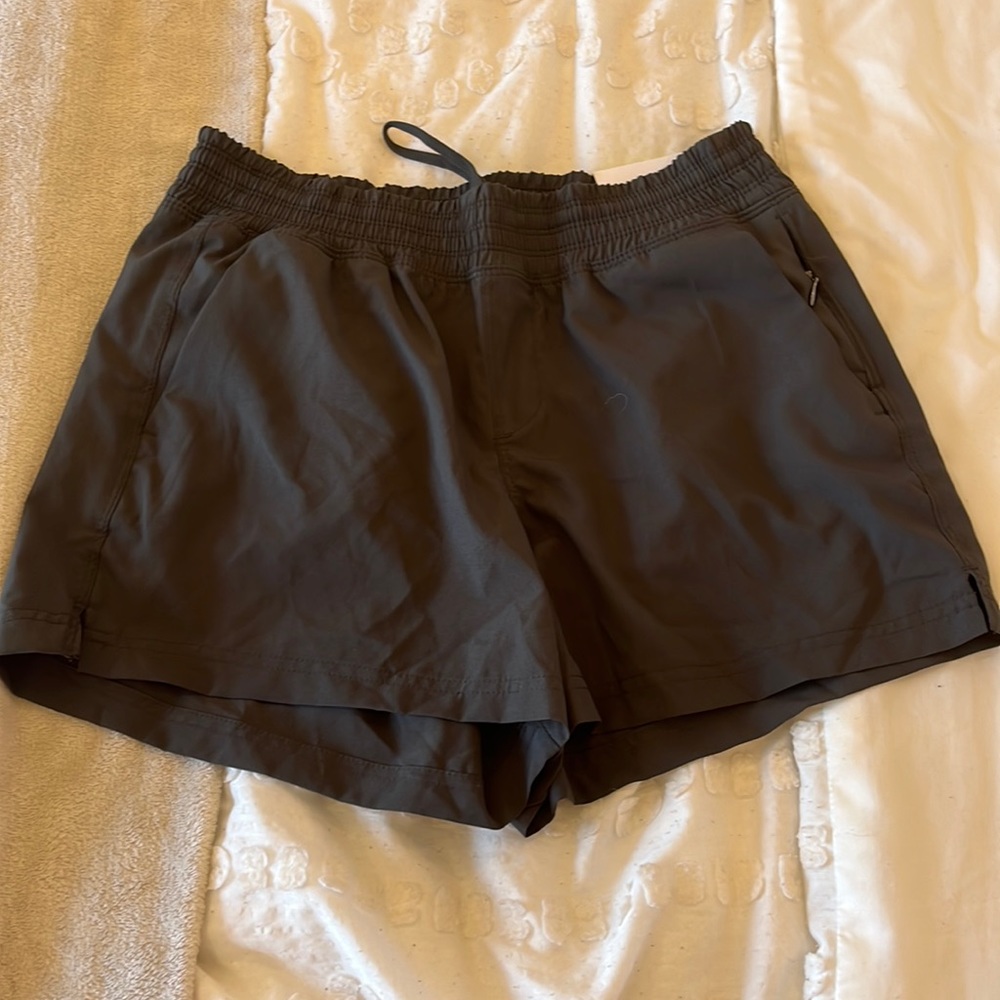 Brand new Old Navy active dark green shorts.